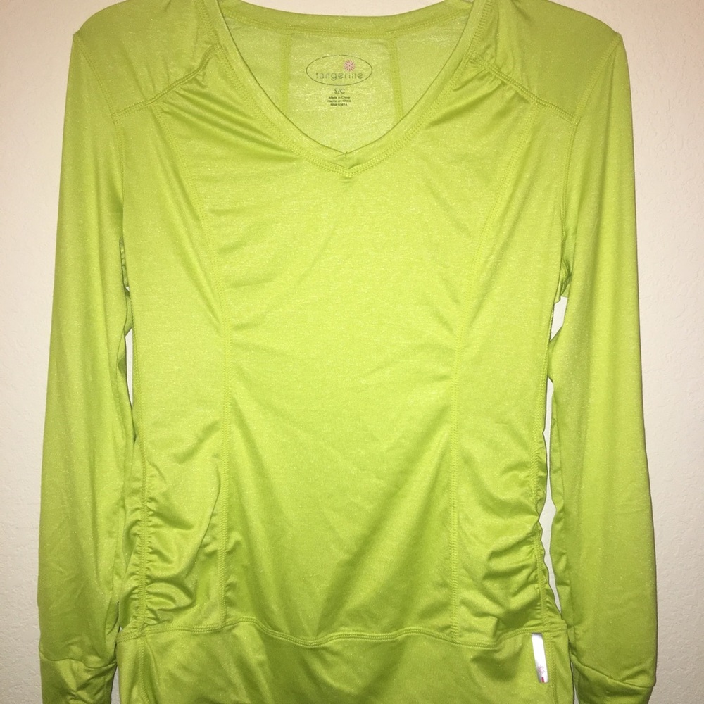 Women’s tangerine active wear long sleeve shirt.